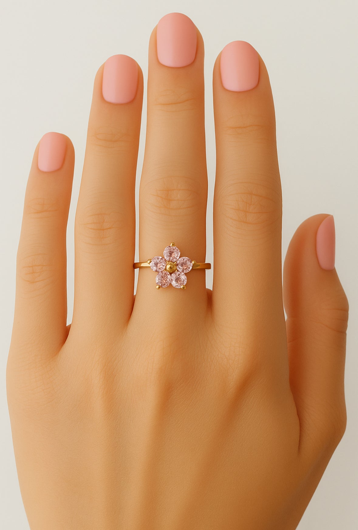 Open ring met roze zirkonia steentjes