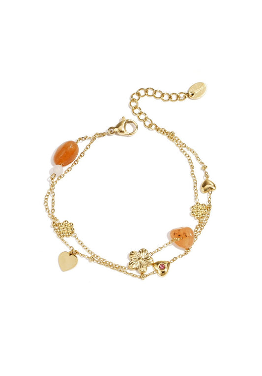 Bedelarmband met oranje kralen, bloemen en hartjes