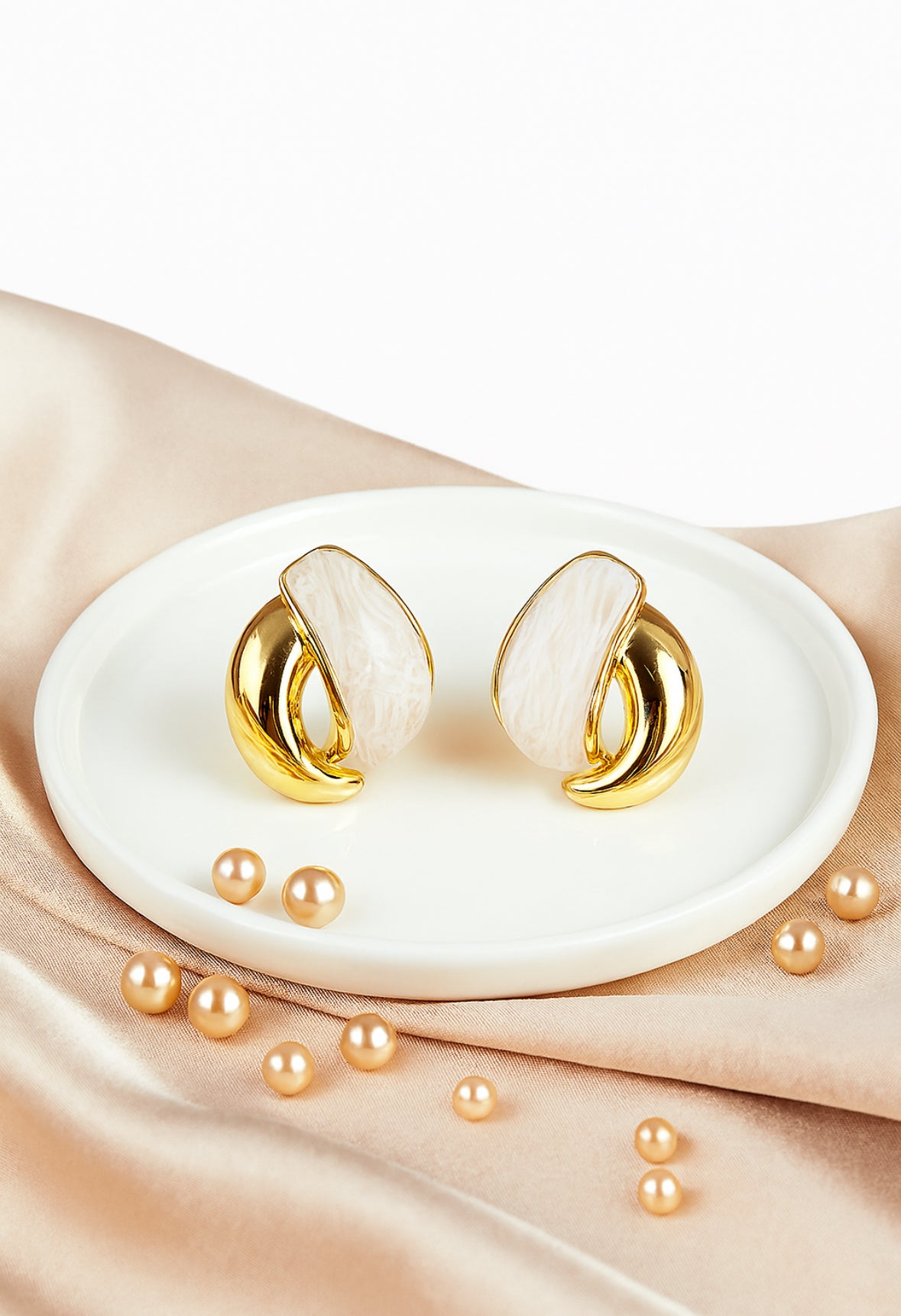 Deja ovalen oorbellen met resin