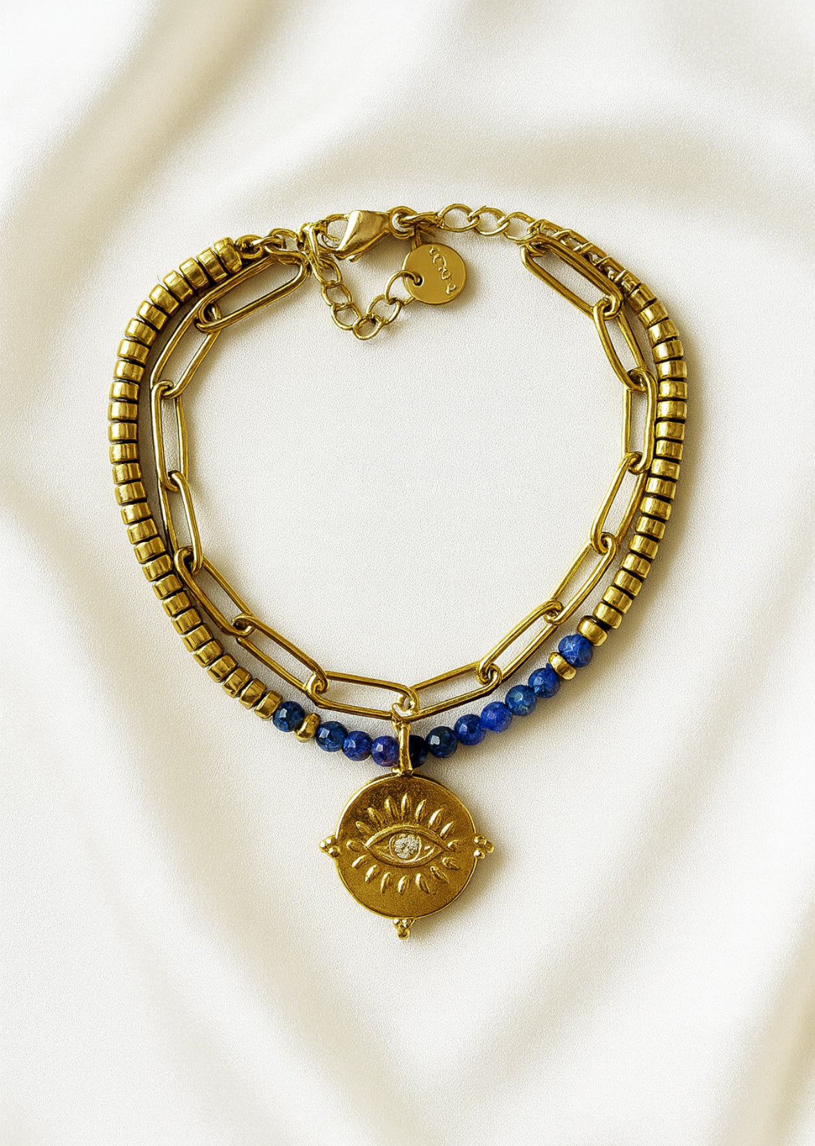 Dubbel armband blauwe kralen en bedel